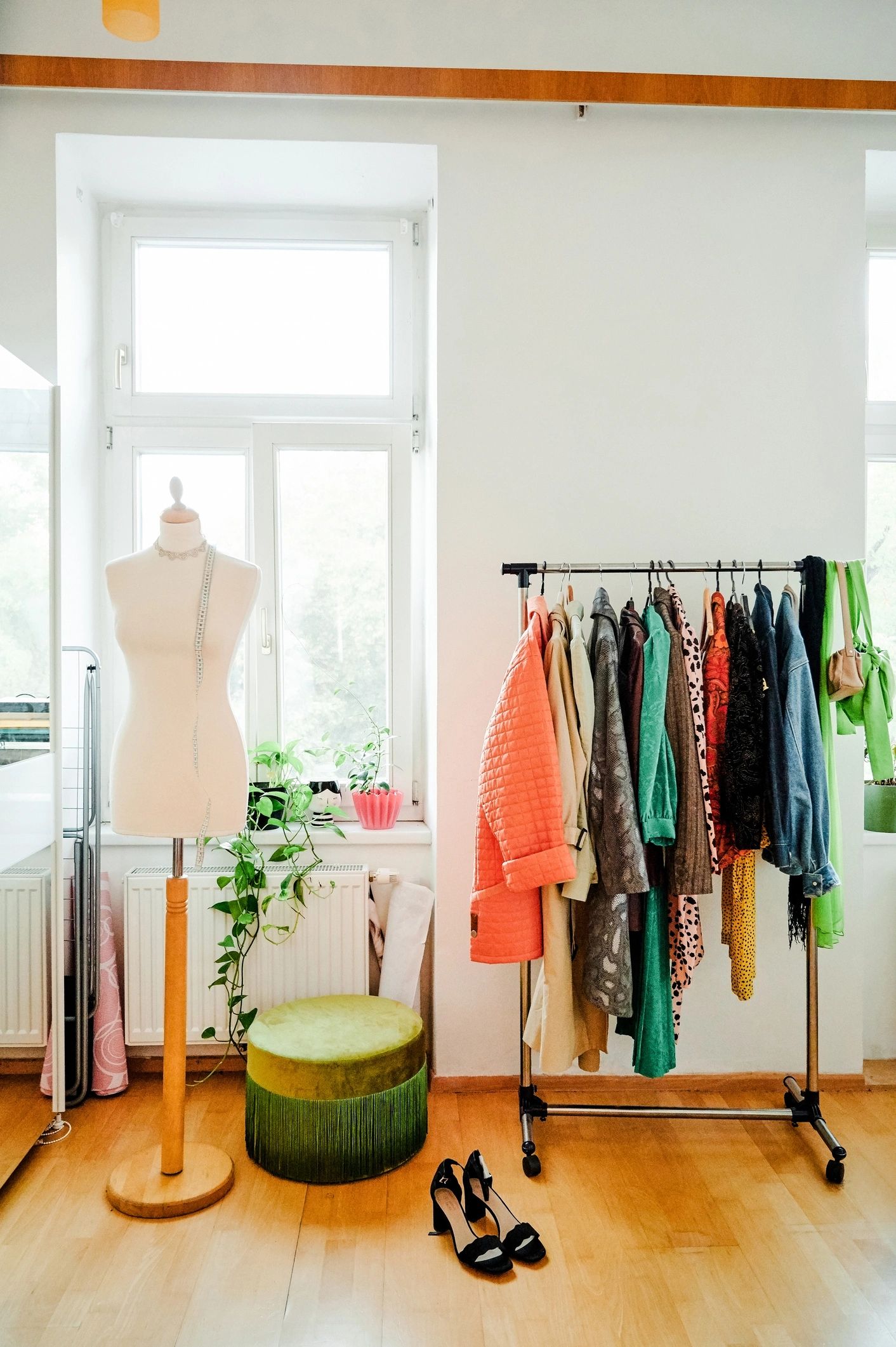 Clothing rail and mannequin in a workshop