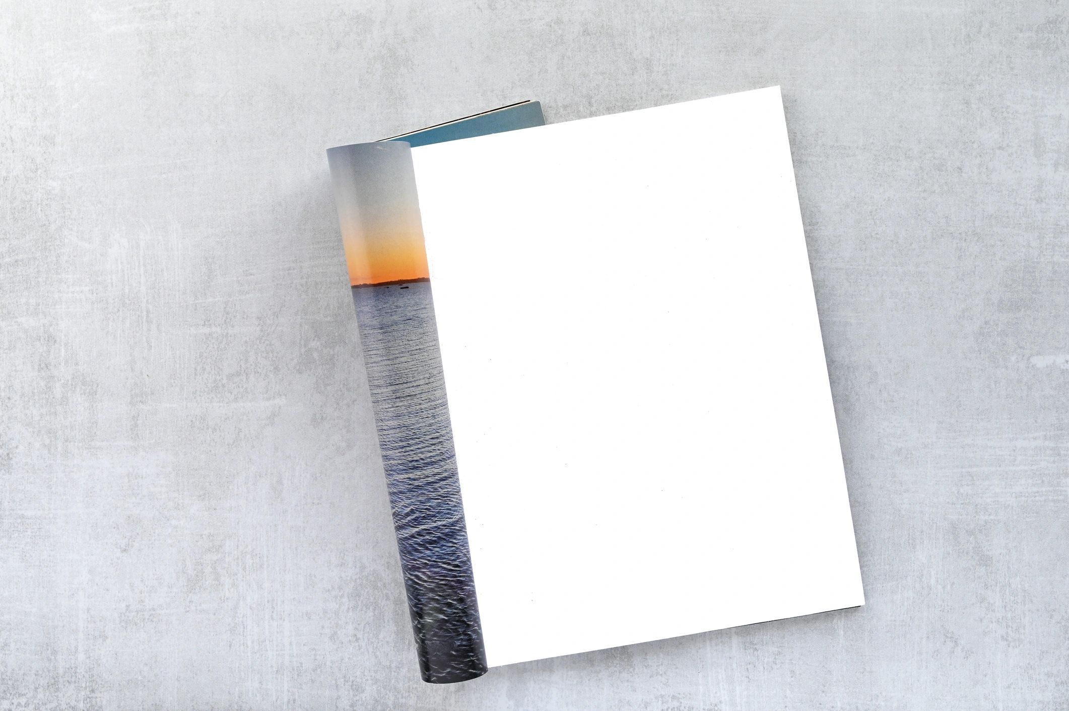 Open magazine with blank white page