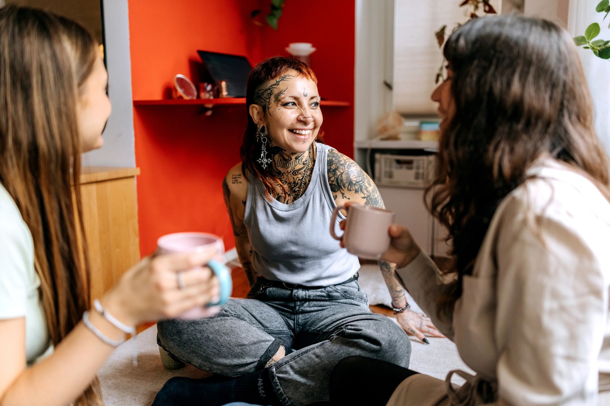 Friends sharing coffee and conversation